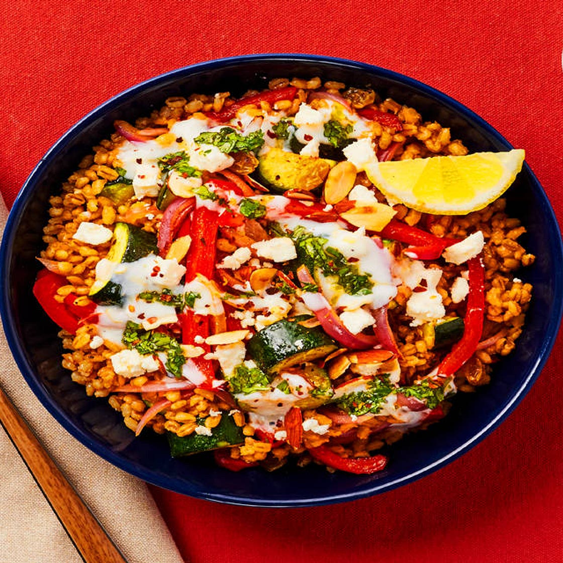 Spicy Harissa Veggie Barley Bowls with Zucchini, Golden Raisins, Chermoula & Lemon Yogurt