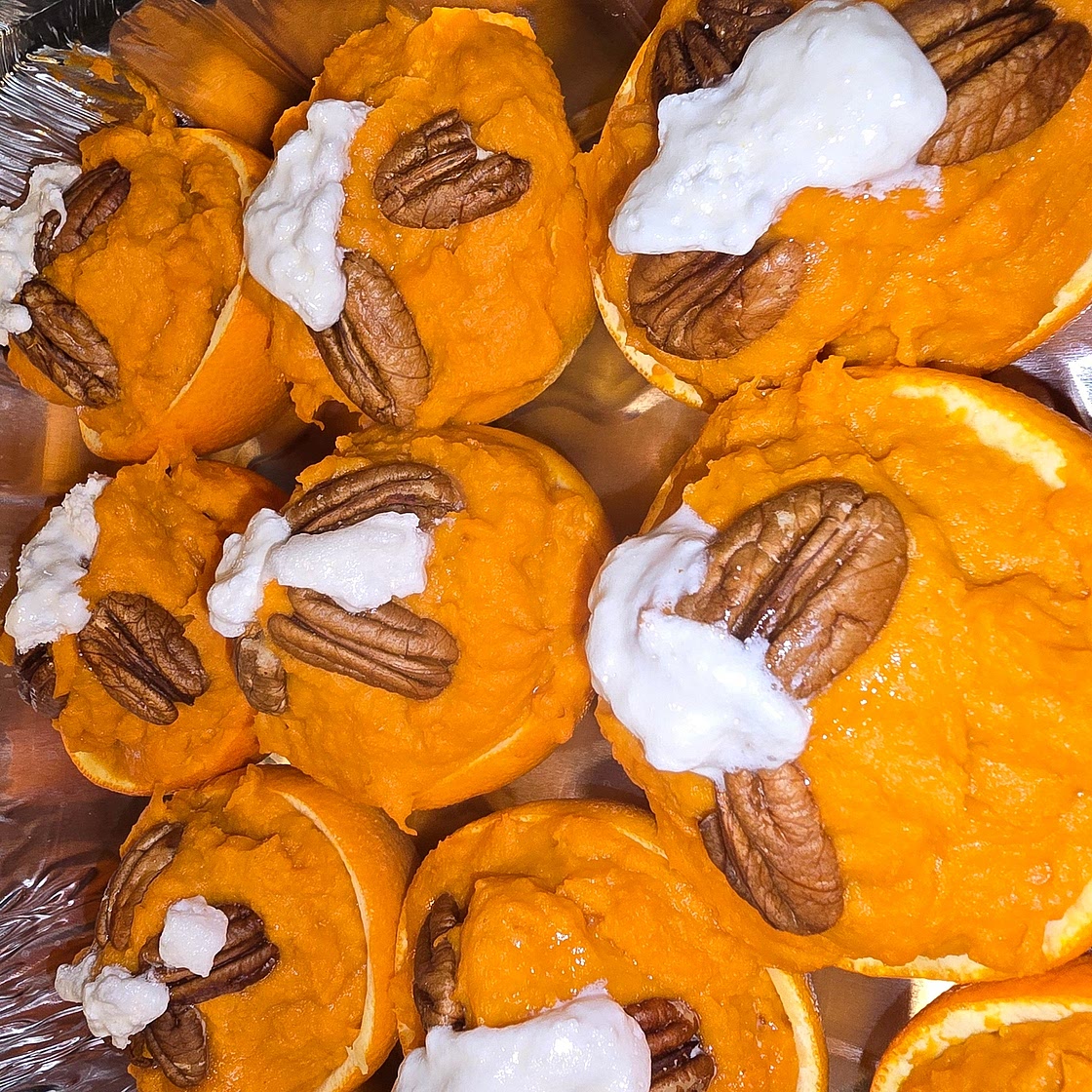 Sweet potatoes in orange halves