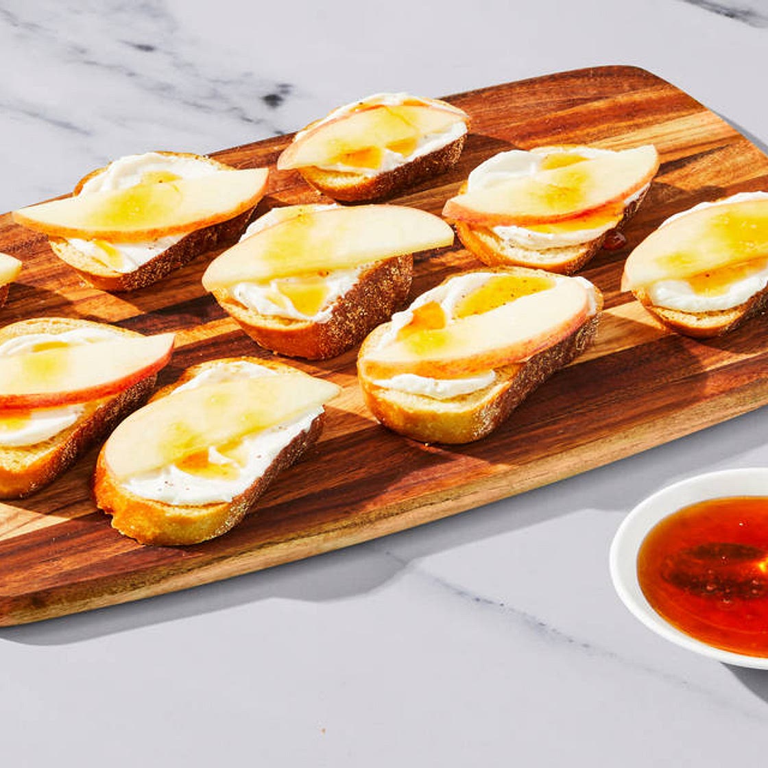 Honey Crème Fraîche & Apple Crostini The best parts of a cheese board– in one bite! | 2-4 Servings