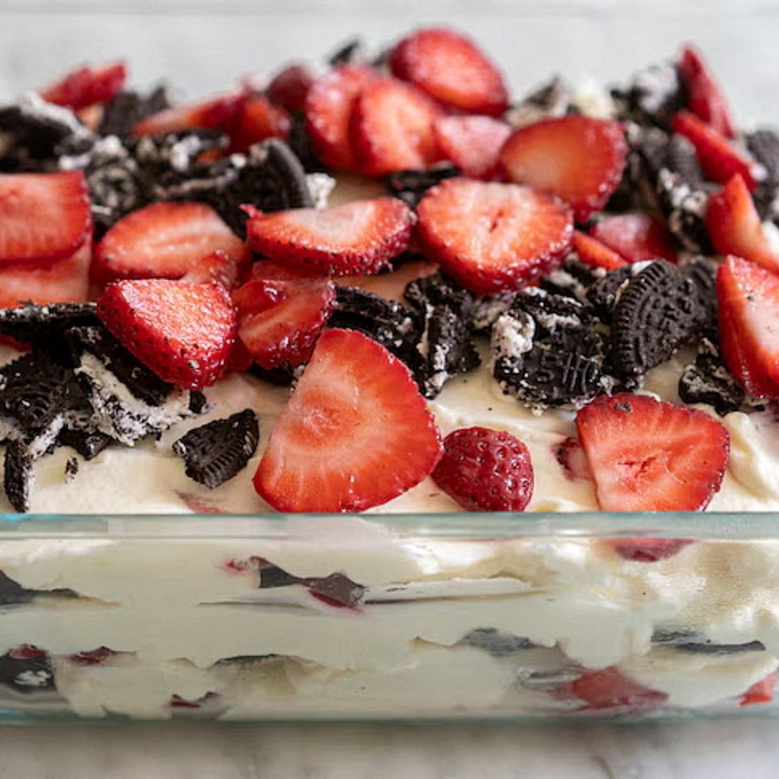 No-bake chocolate biscuit and strawberry cream cake
