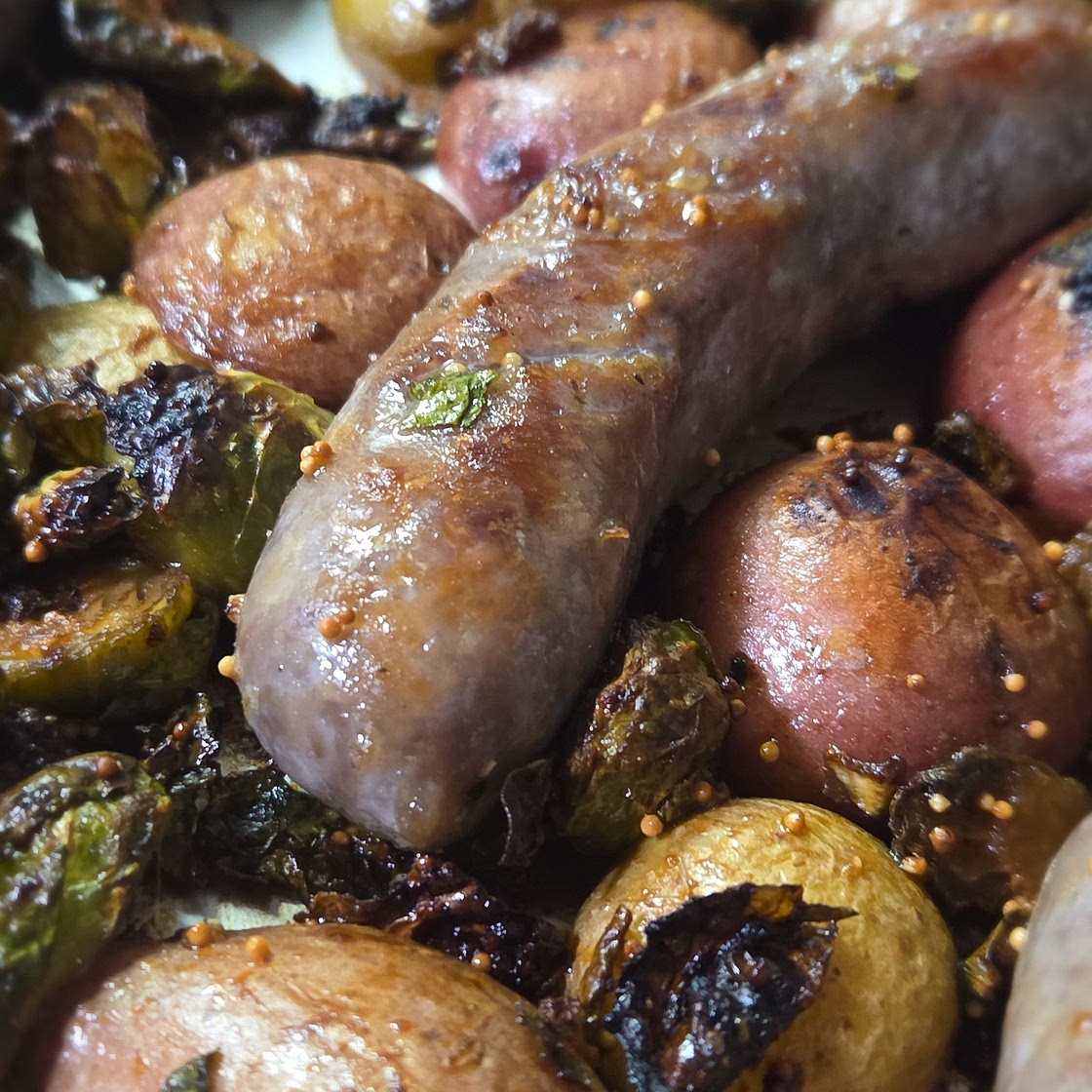 Sheet-Pan Sausages and Brussels Sprouts With Honey Mustard