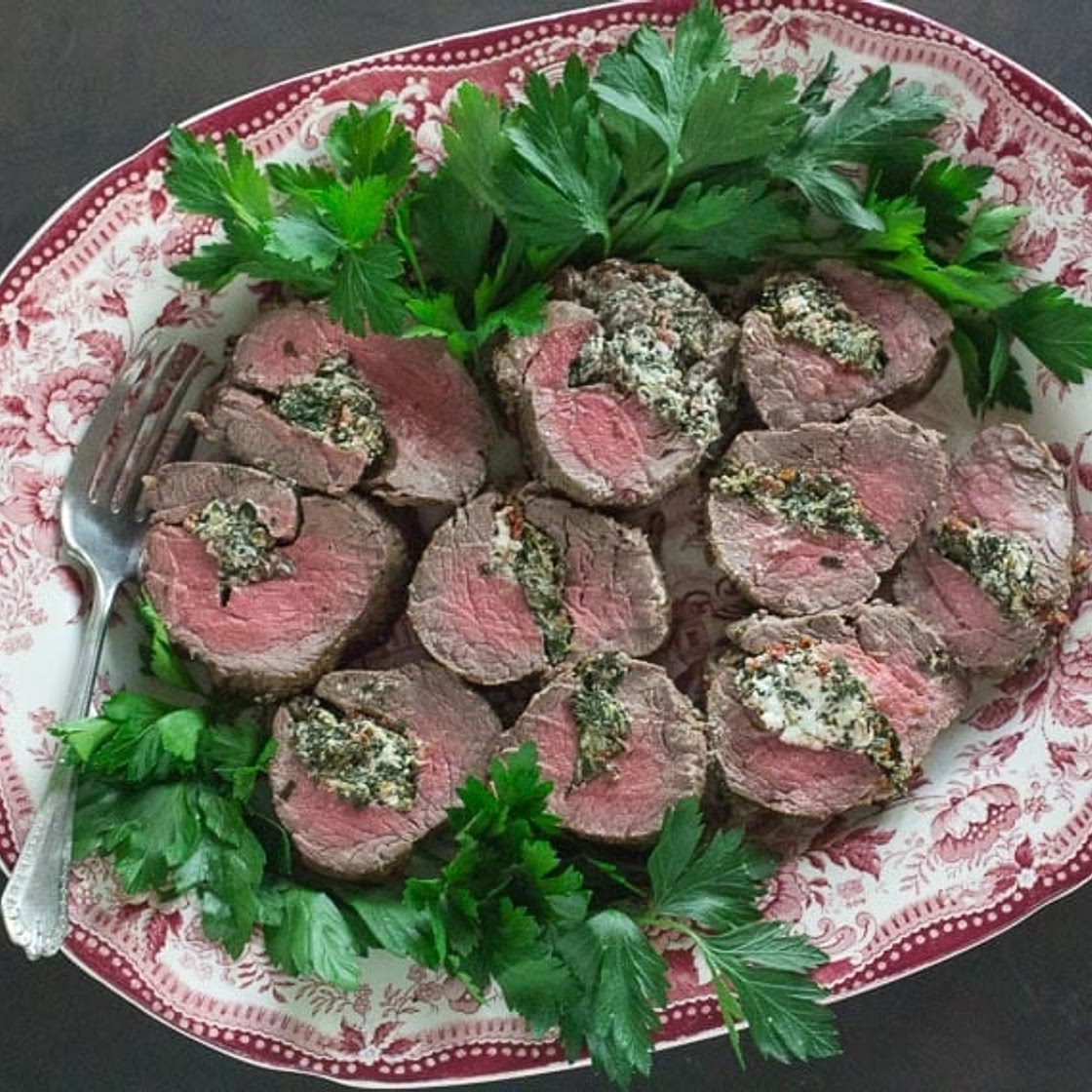 Beef Tenderloin Stuffed with Goat Cheese, Spinach & Sun-Dried Tomatoes