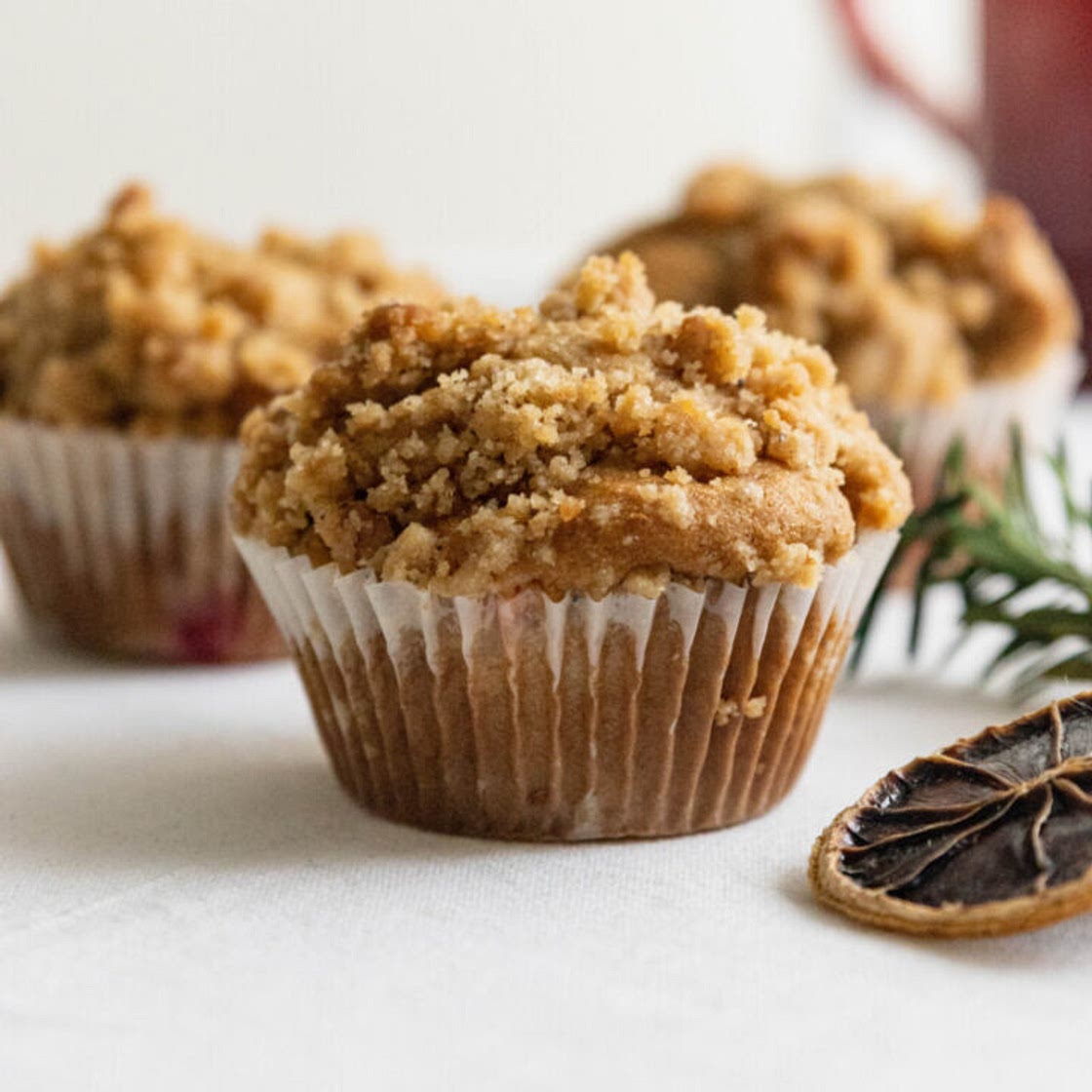 Spiced Cranberry Orange Muffins with Walnut Crumb Topping