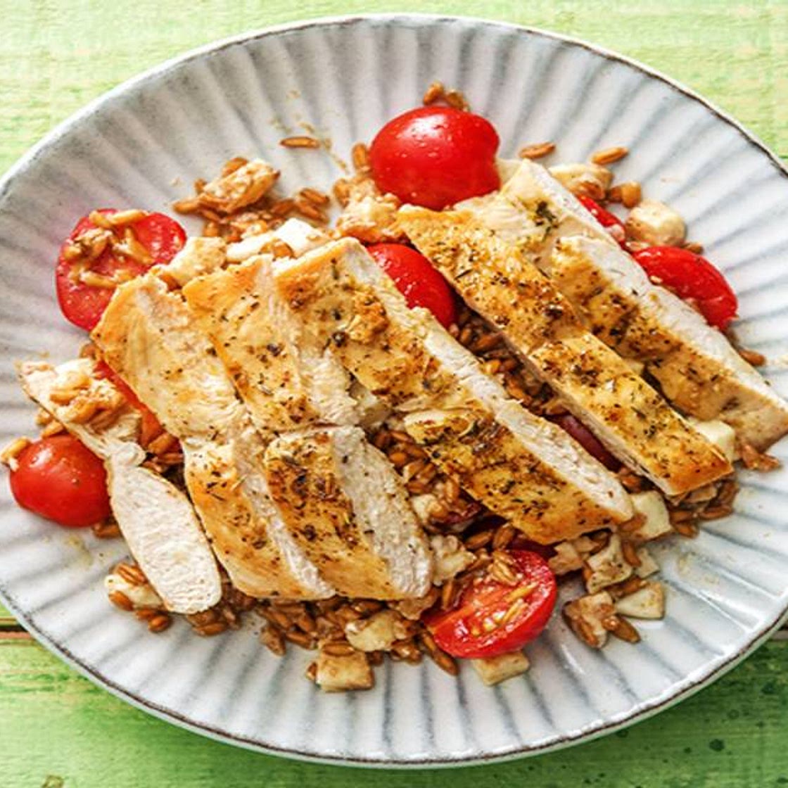 Herbs de Provence Chicken over a Warm Farro, Mozzarella, and Tomato Jumble