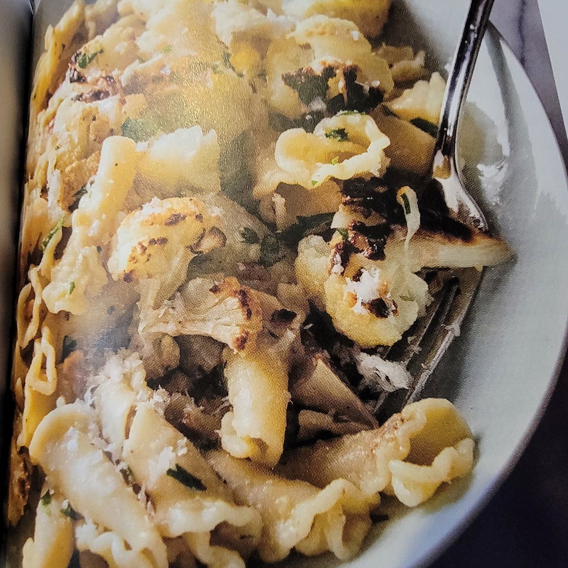 Pasta with roasted cauliflower, garlic, and walnuts