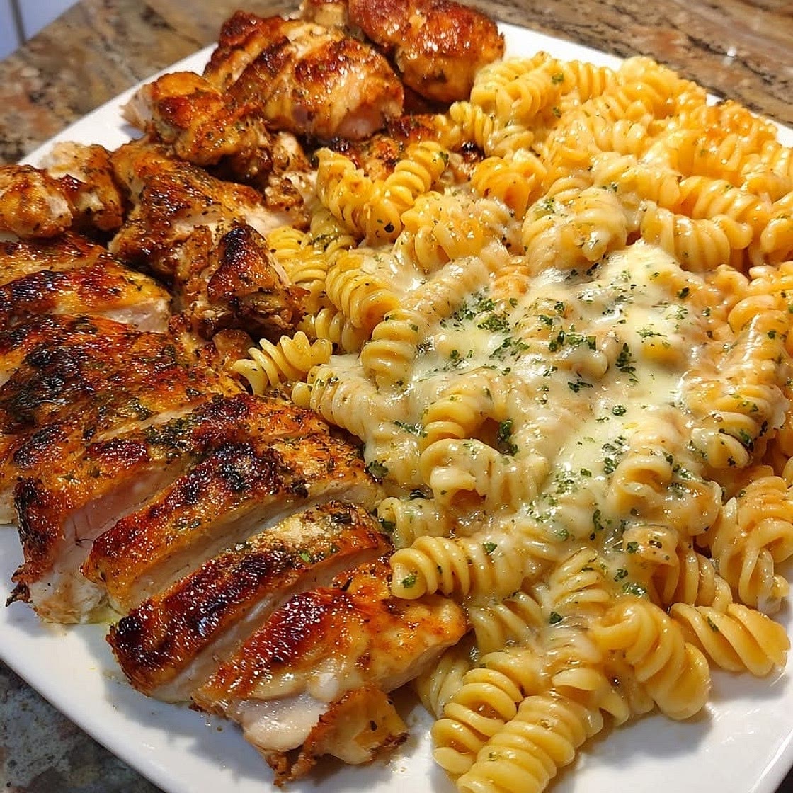 Cheesy chicken pasta with mozzarella garlic sauce 