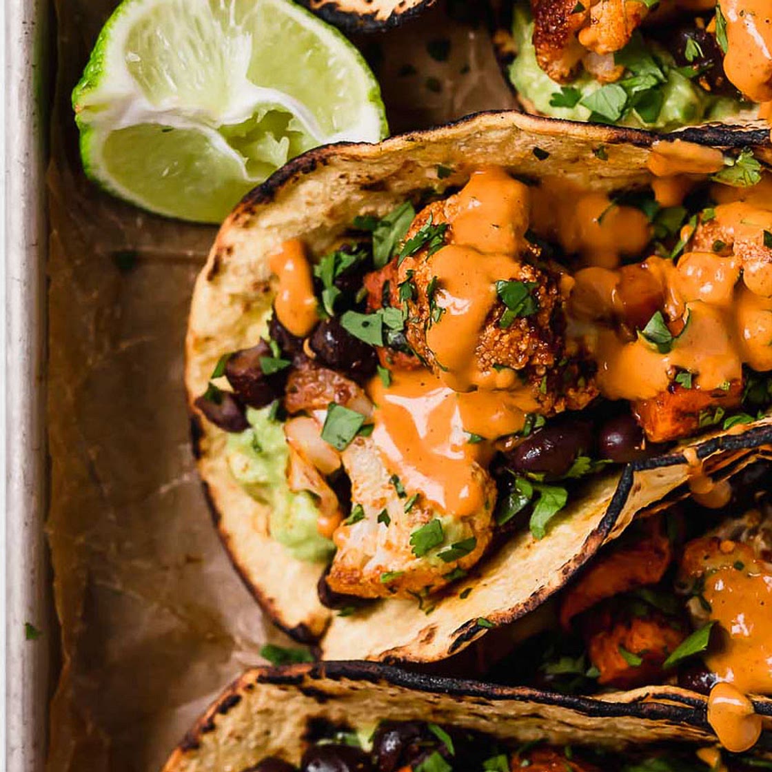 Roasted Sweet Potato & Cauliflower Tacos with Chipotle Cashew Crema