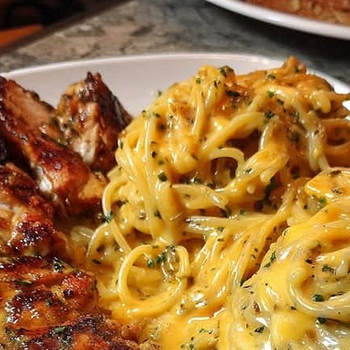 Velveeta Garlic Butter Chicken with Spaghetti Alfredo