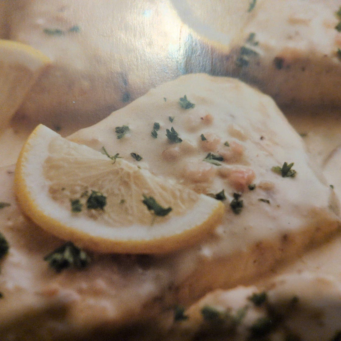 Baked fish with lemon cream sauce