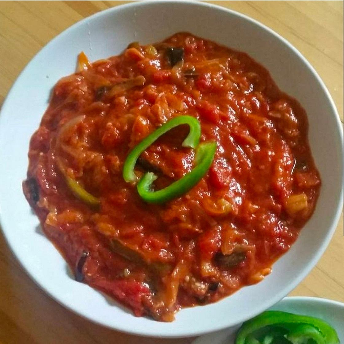 Eggplant with tomato sauce / بيتنجان مطبق
