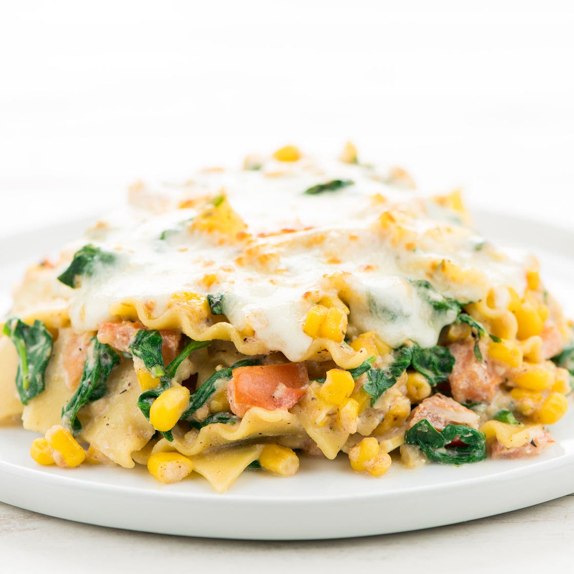 Skillet Lasagna Bianca with spinach and roasted corn