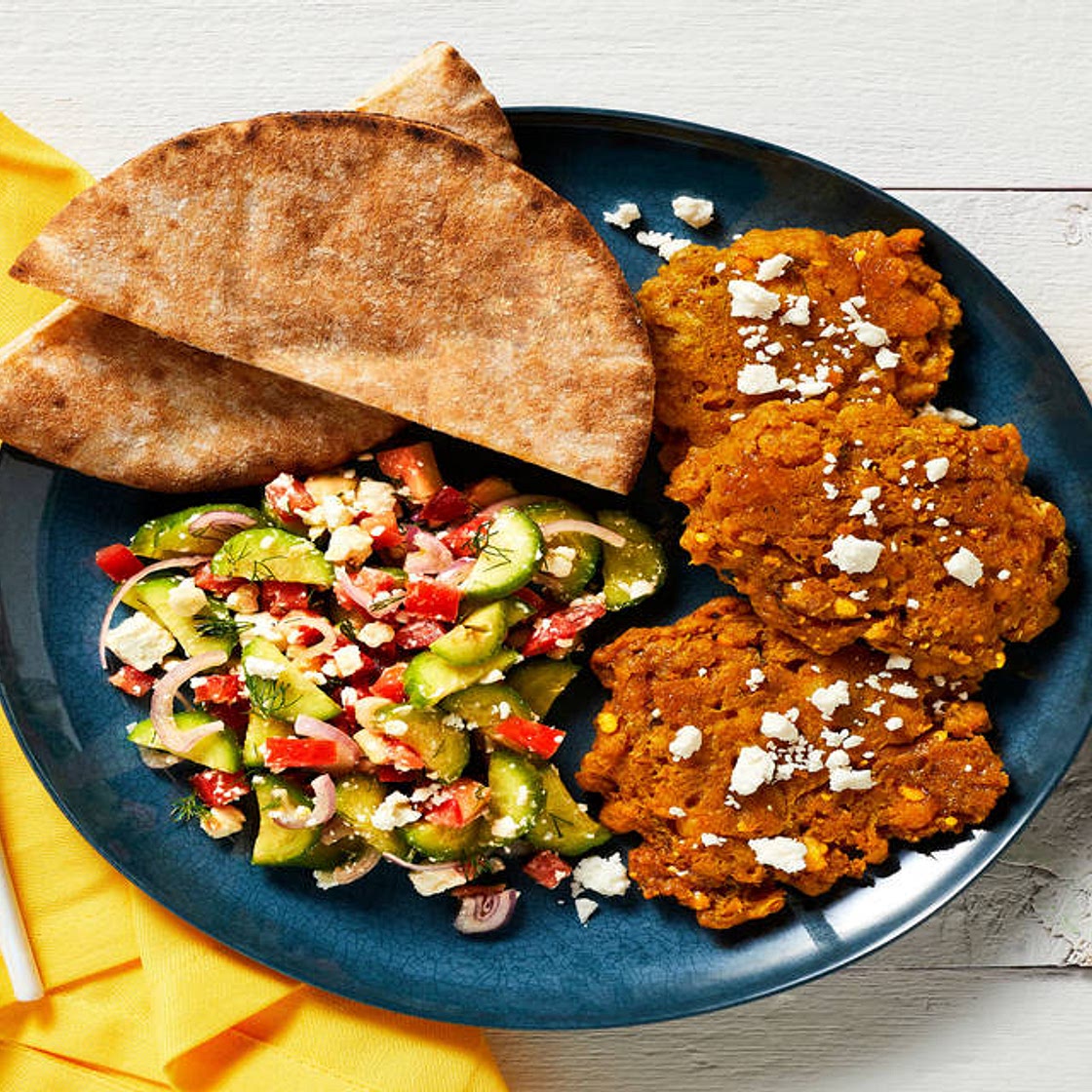 Spiced Chickpea Fritters with Greek Salad, Pita & Garlicky White Sauce