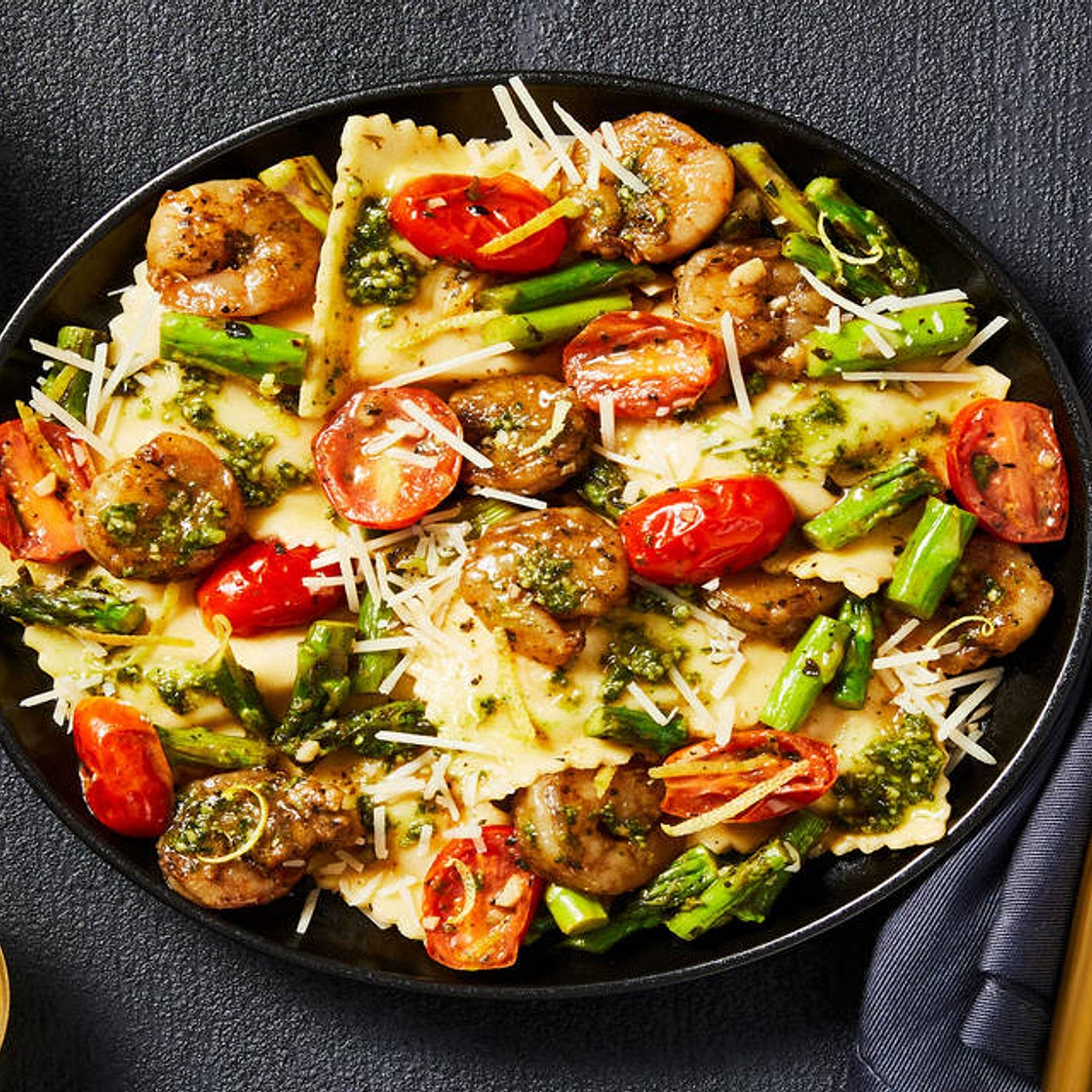 Pesto Shrimp & Lobster Filled Ravioli with Lemony Asparagus & Grape Tomatoes
