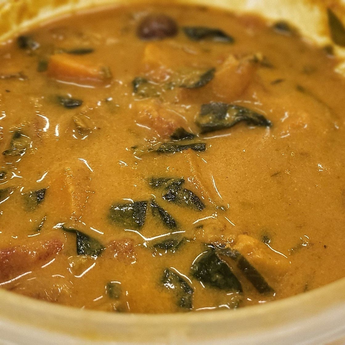 Spicy Peanut Soup with Sweet Potato + Kale