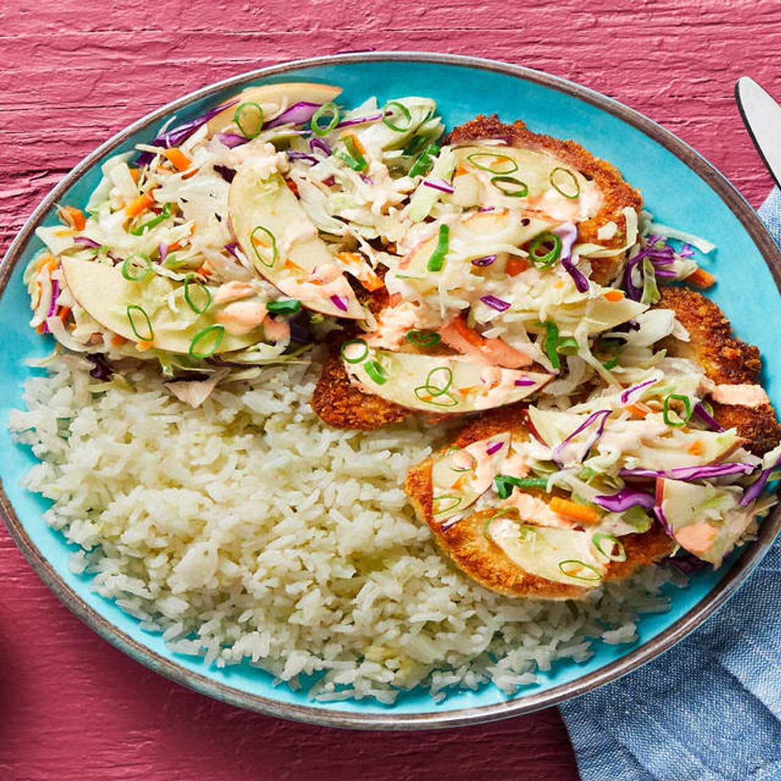 Panko Pork Cutlets with Apple Slaw Scallion Rice & Sriracha Crema
