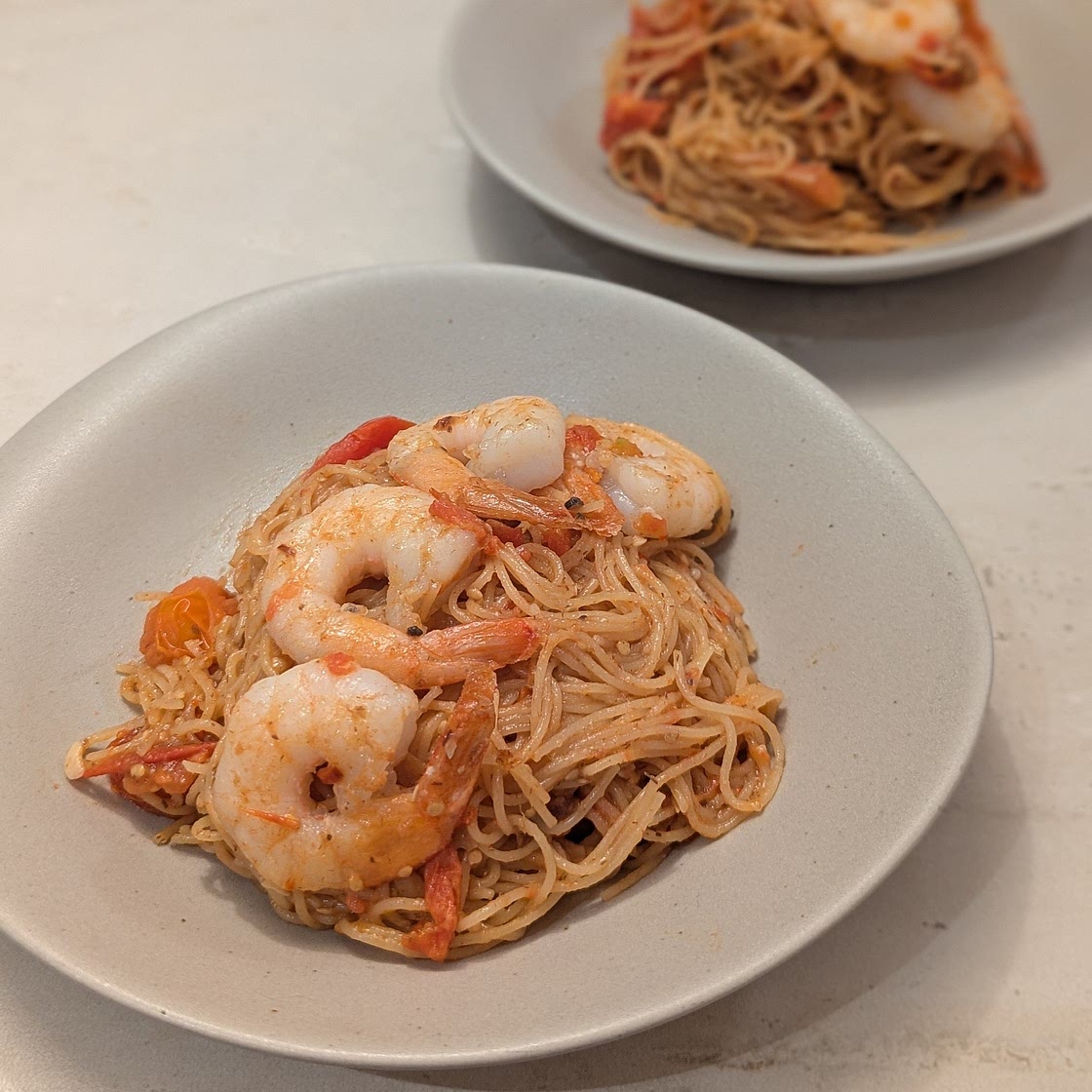 Cookish Spaghetti with Anchovies, Raisins and Cherry Tomatoes