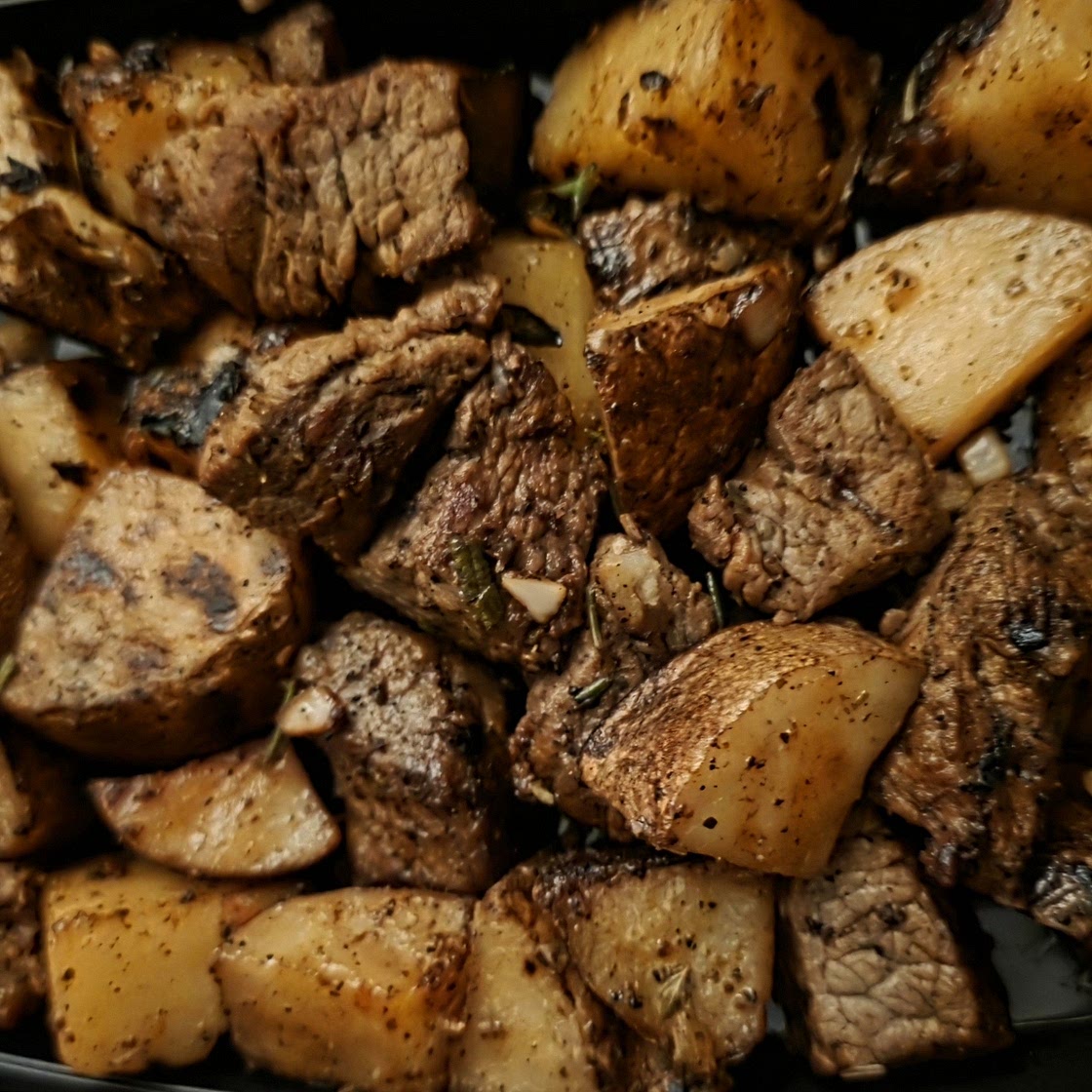 Garlic Butter Herb Steak Bites with Potatoes