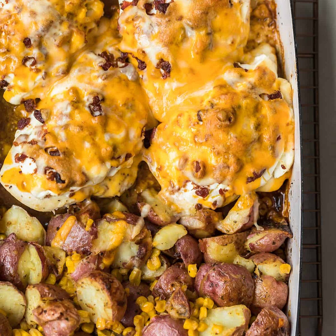 One Pan Cheesy Bacon Crusted Chicken with Ranch Potatoes and Corn