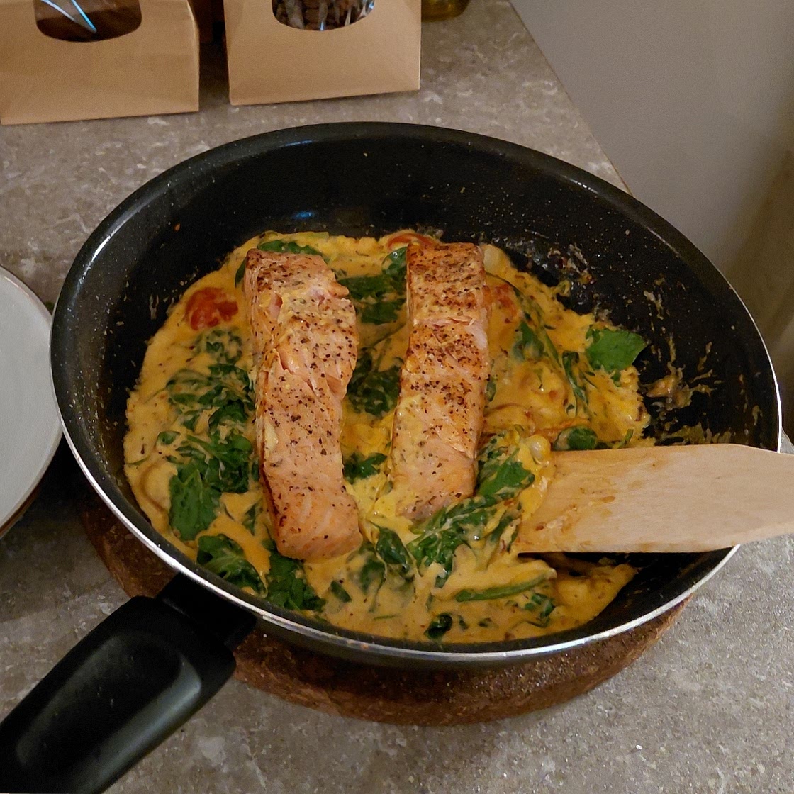 One-Pan Spinach and Artichoke Salmon with Tomatoes