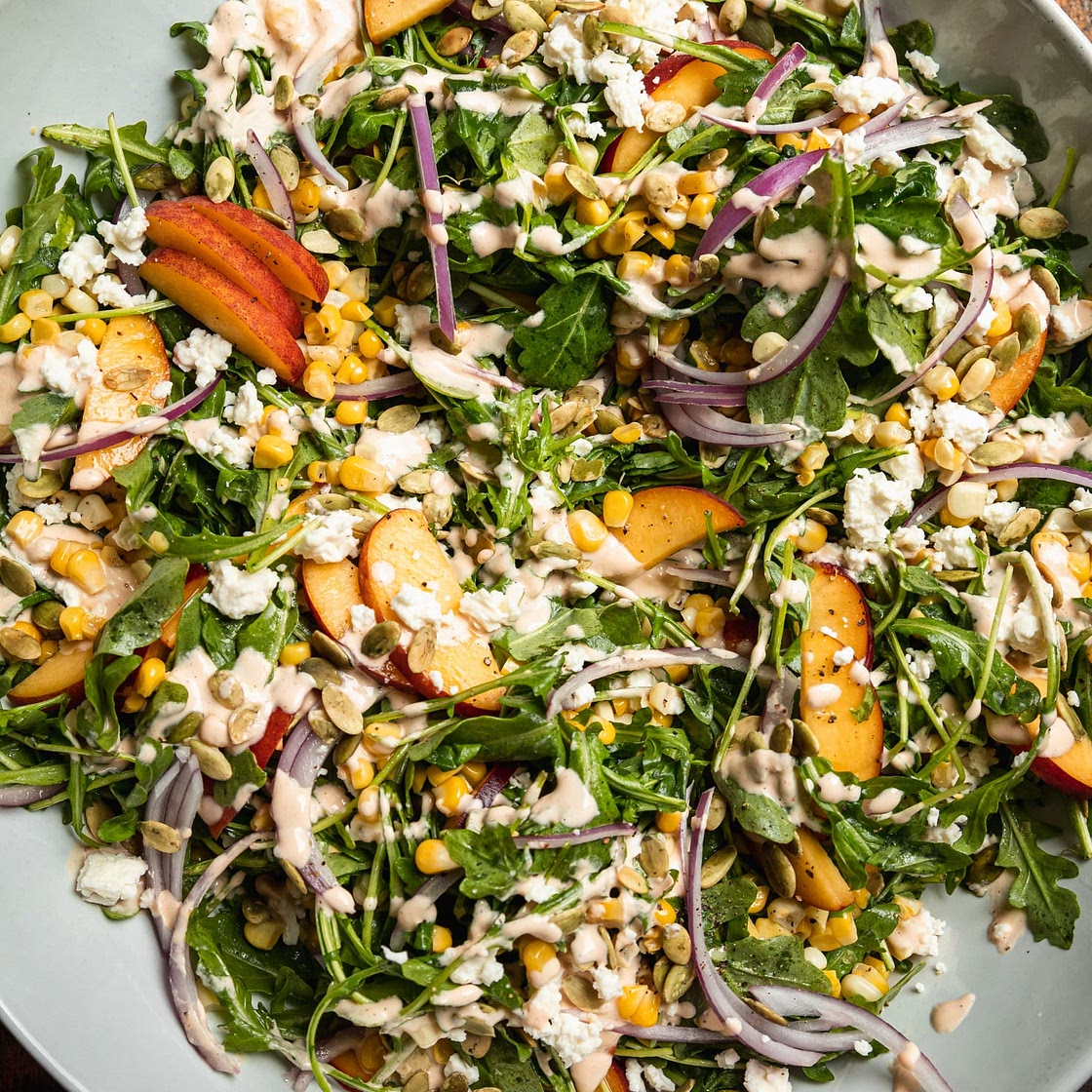 Fresh Summer Salad with Arugula, Corn & Spicy Cashew Dressing