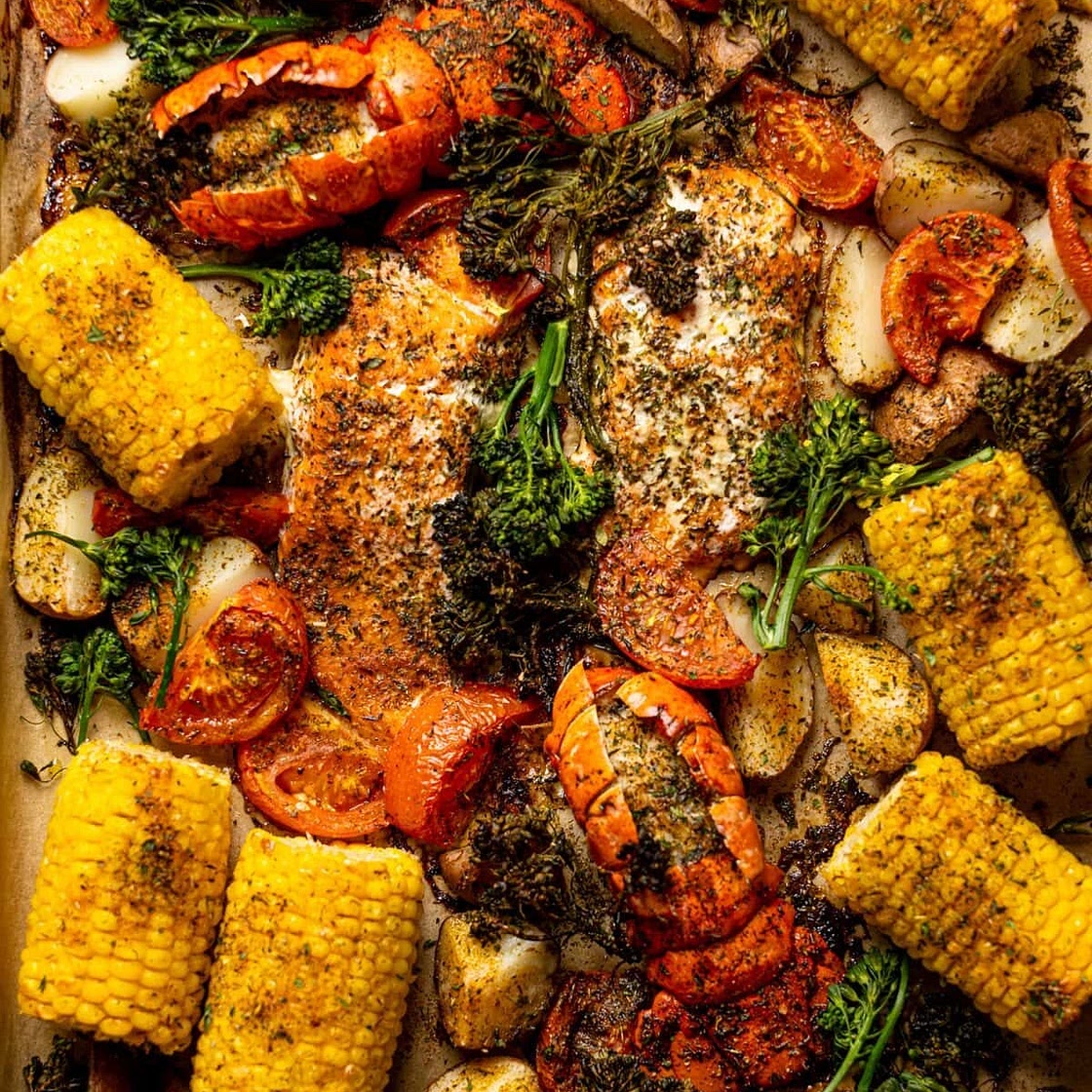Sheet Pan Garlic Herb Salmon, Lobster, + Veggies