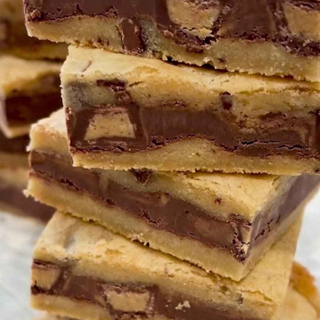 Layered Nutella and Reese Chocolate Chip Cookie Bars