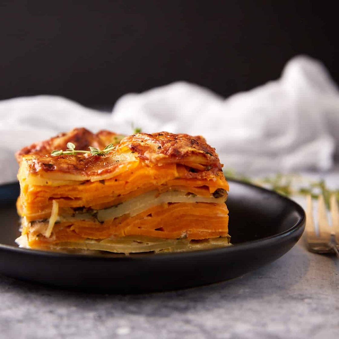 Scalloped Sweet Potatoes with Two Types of Potatoes