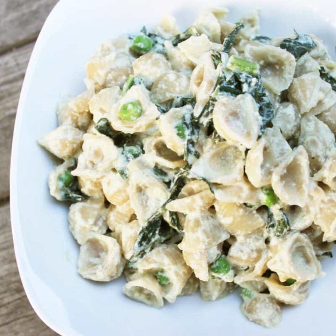 Creamy Pumpkin Seed Alfredo With Kale and Sweet Peas