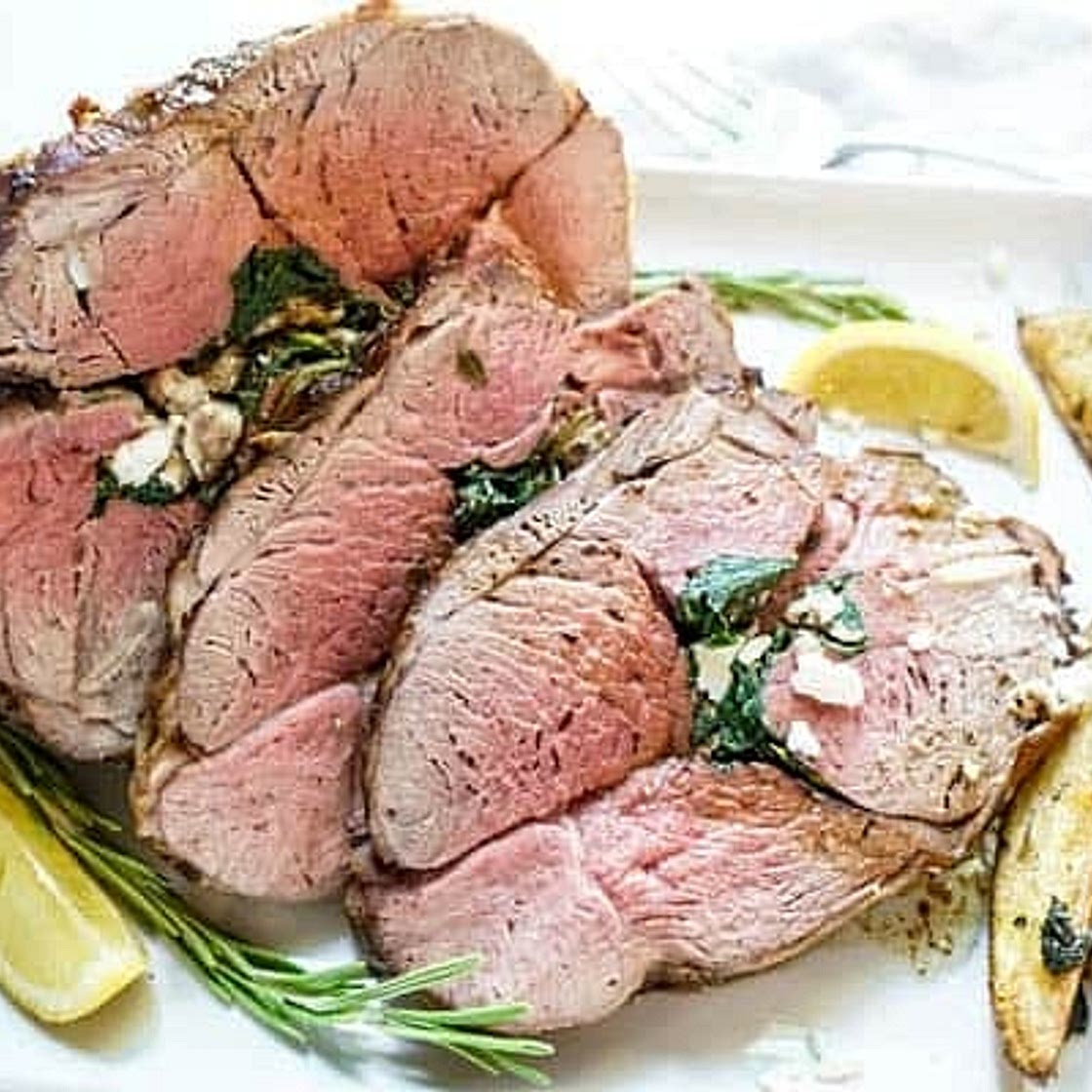 Gemisto Ami me Feta (Rolled Stuffed Leg of Lamb)