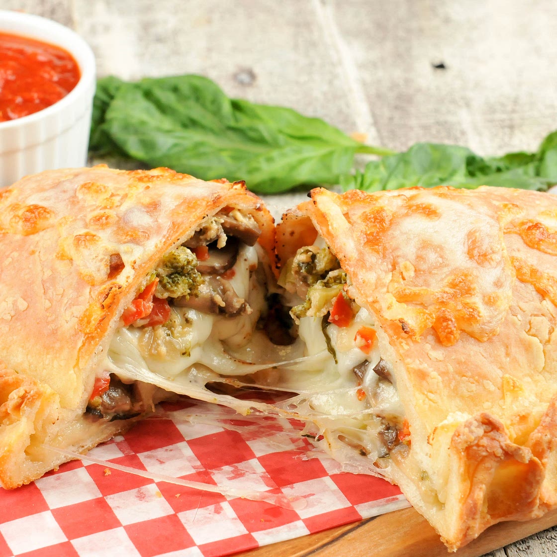 Calzone with Broccoli, Red Peppers, and Mushrooms with marinara dipping sauce