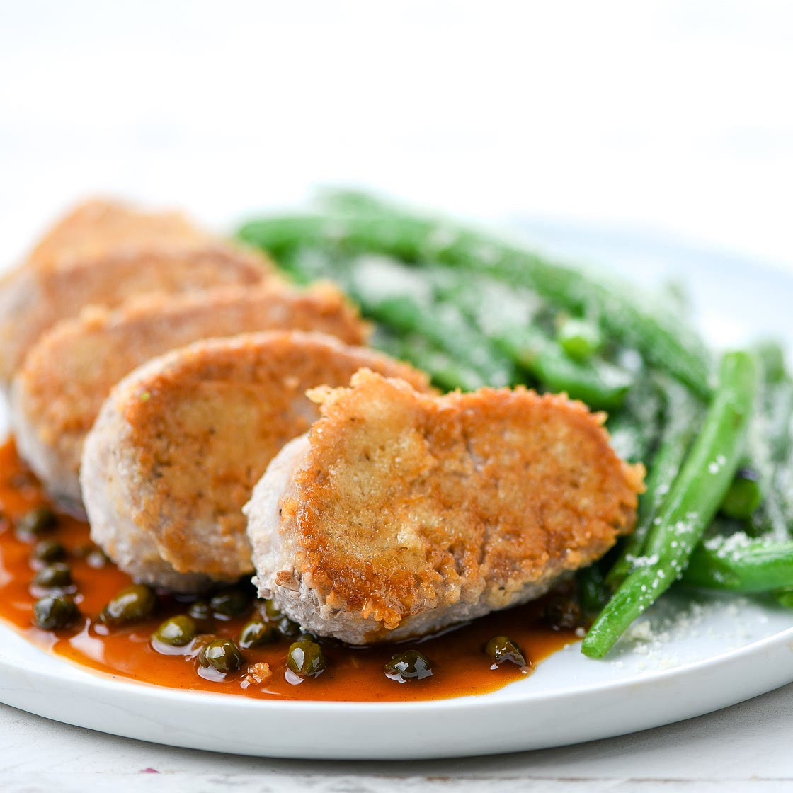 Parmesan-Crusted Pork Piccata Medallions and green beans
