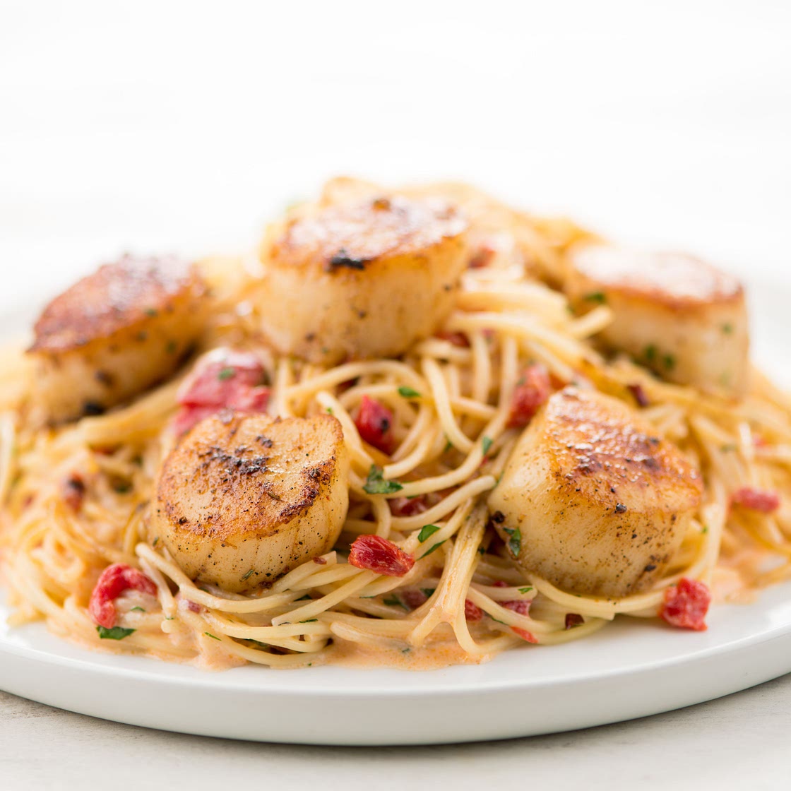 Blackened Scallop Pasta with red pepper cream