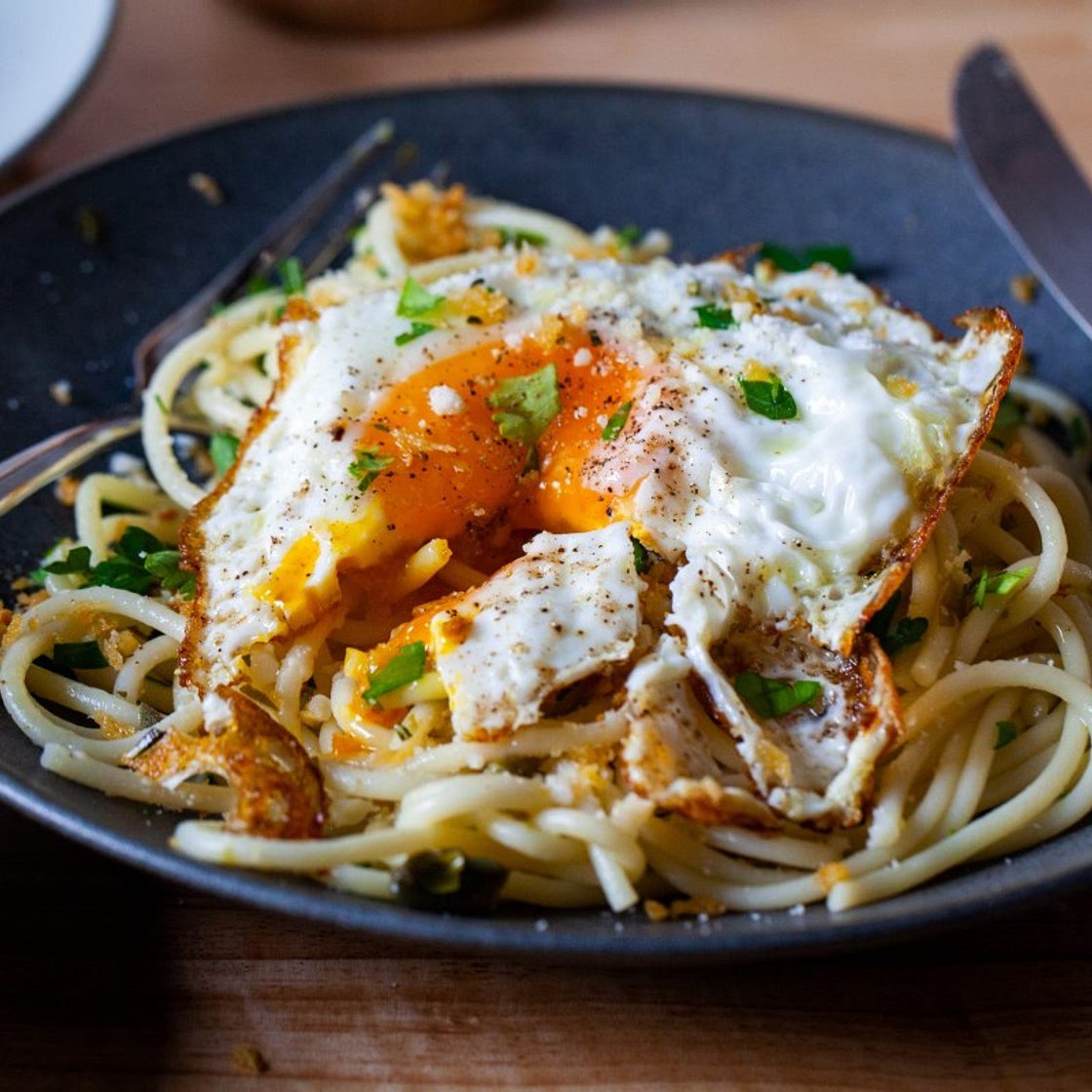 spaghetti pangrattato with crispy eggs