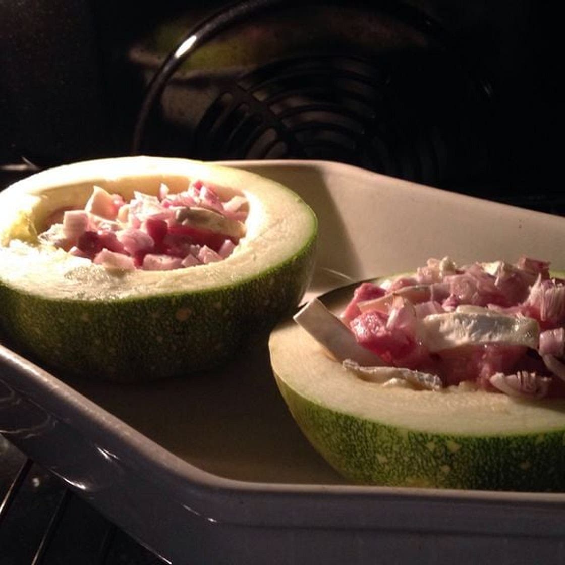 Courgette farcie aux fromages et lardons