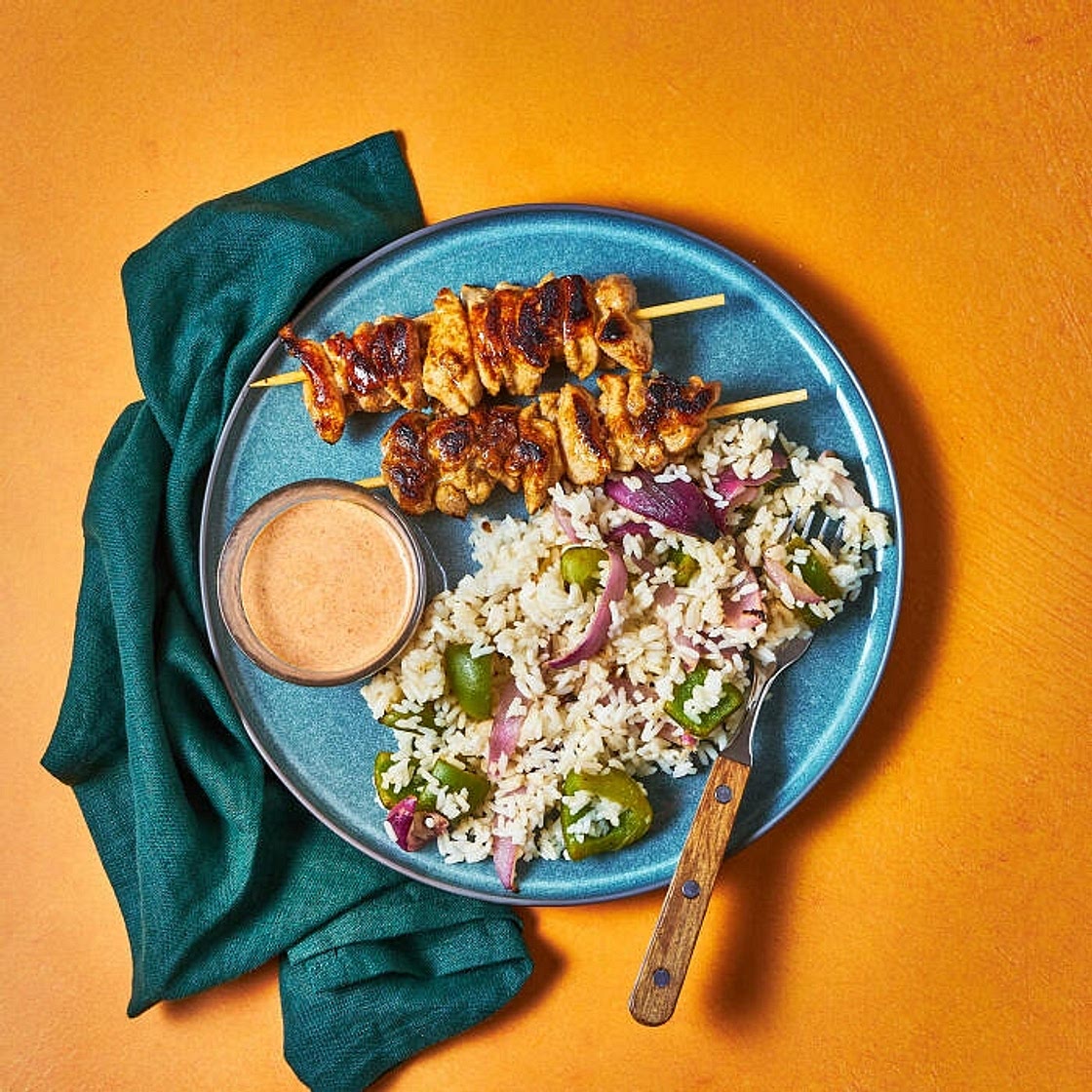 Honey-lime chicken skewers with charred veg rice, buttered corn cobettes & smoky mayo