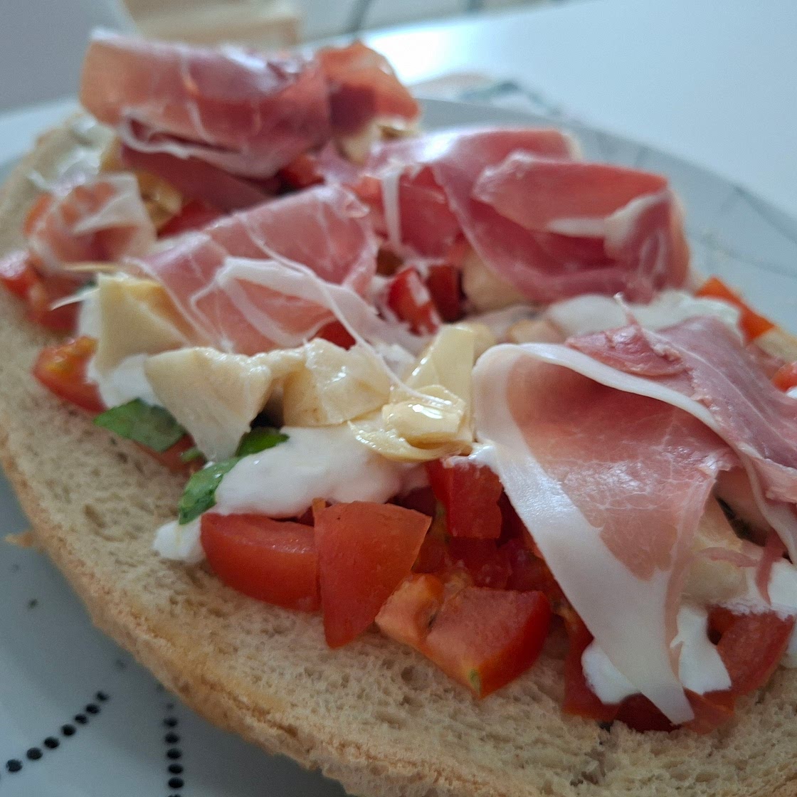 Bruschetta - Pickled artichokes and prosciutto crudo