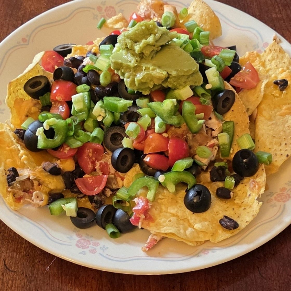 These Easy Sheet Pan Chicken Nachos Will Make You a Dinner Hero