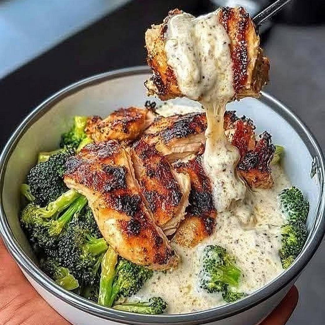 Char-Grilled Chicken and Broccoli Rice Bowl with Velvety Garlic Drizzle