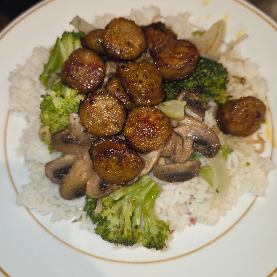 Lemon grass sausage over rice
