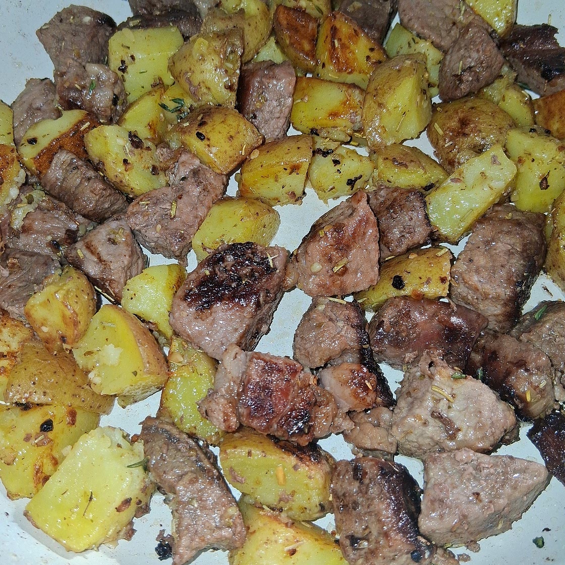 Garlic Butter Herb Steak Bites with Potatoes