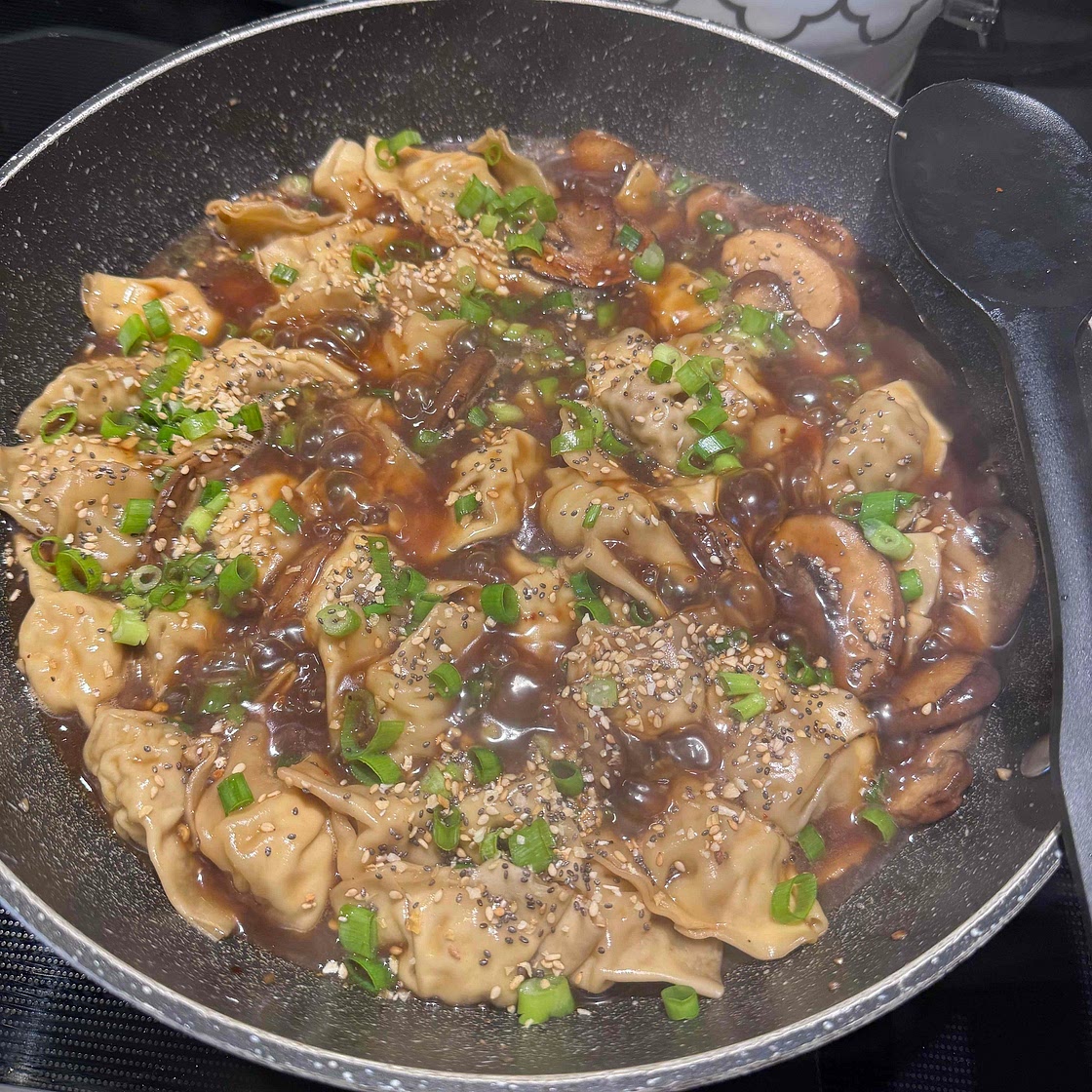 Chicken Wontons in Spicy Chili Sauce
