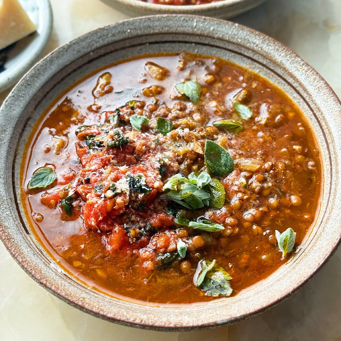 Lentil, fennel and parmesan “stoup” with charred tomato salsa