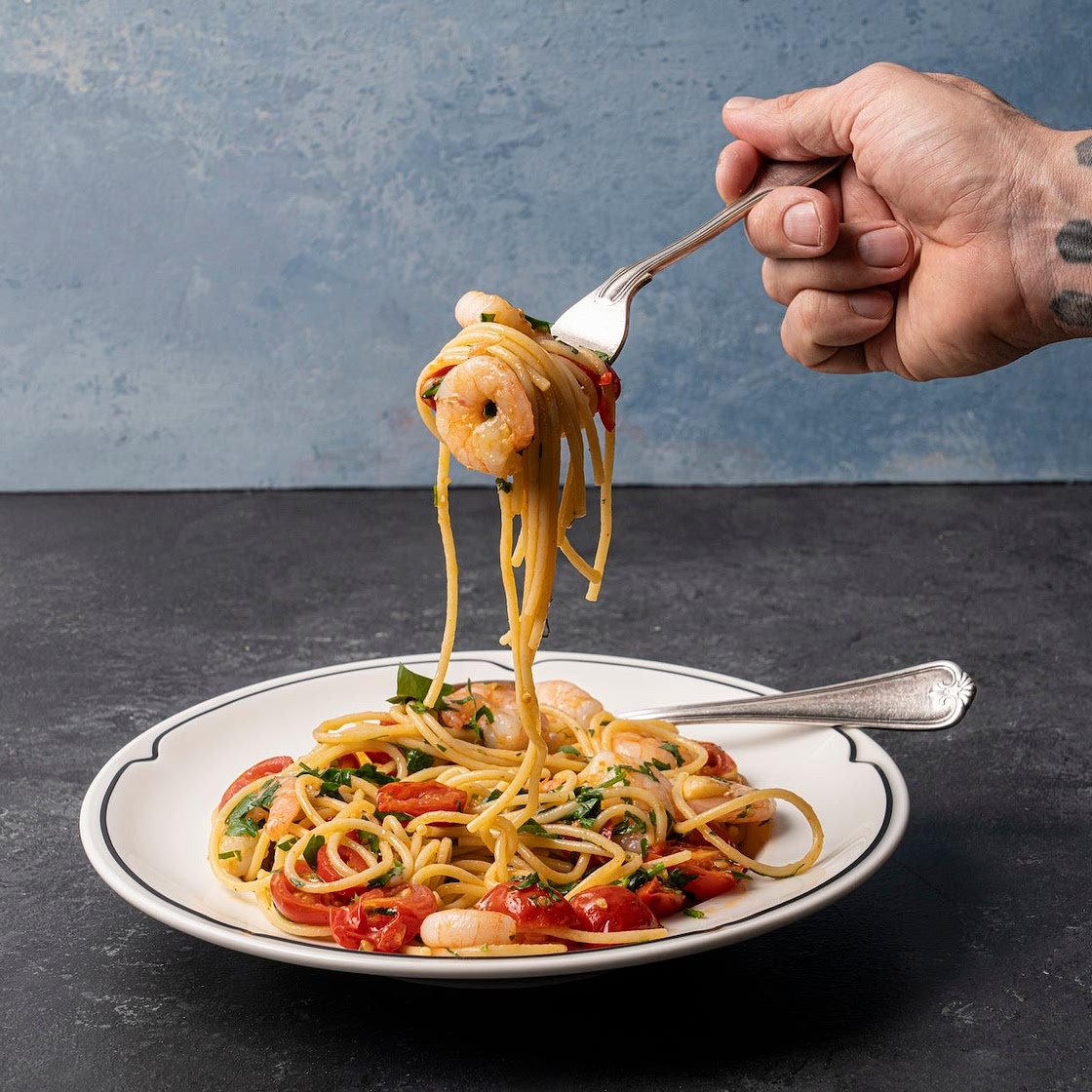 Spaghetti with prawns, chilli and cherry tomatoes