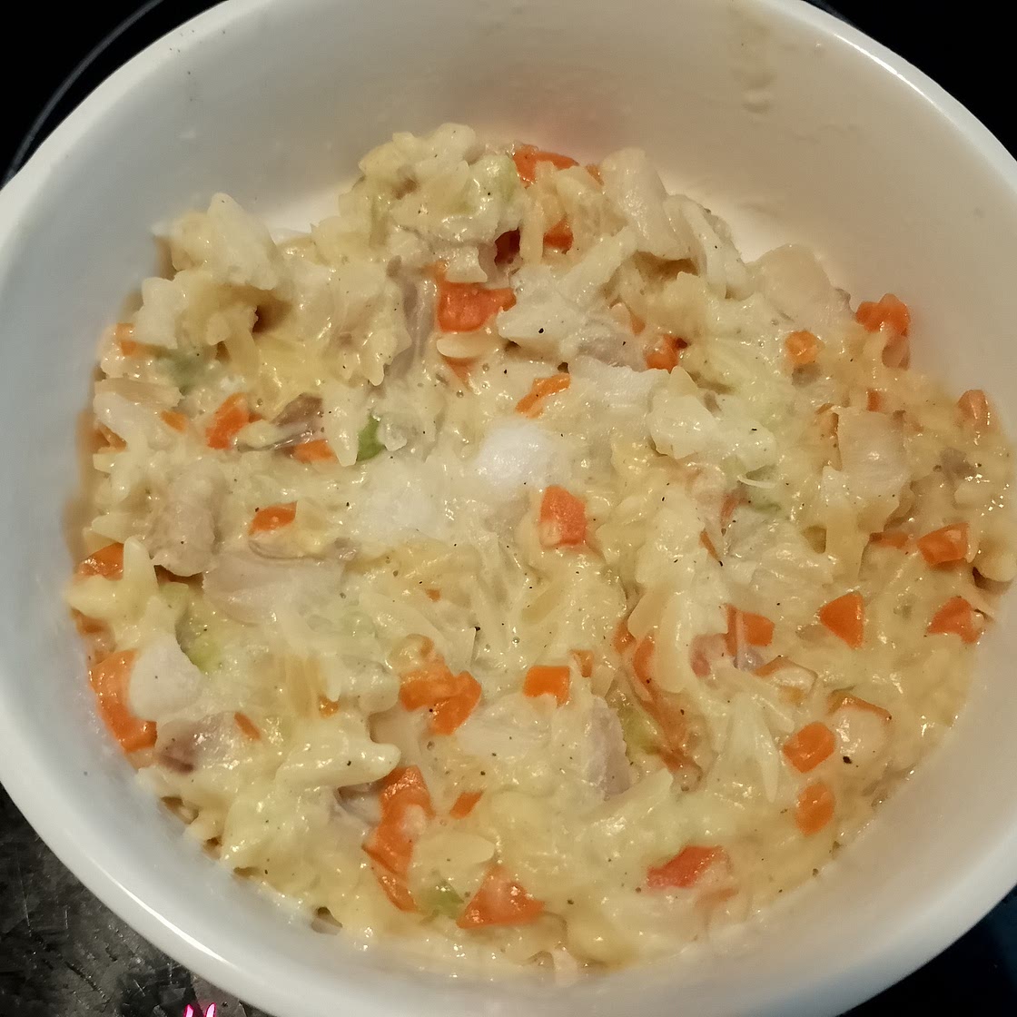 Orzo, carotte, courgette et filet de poisson à la crème de vache qui rit