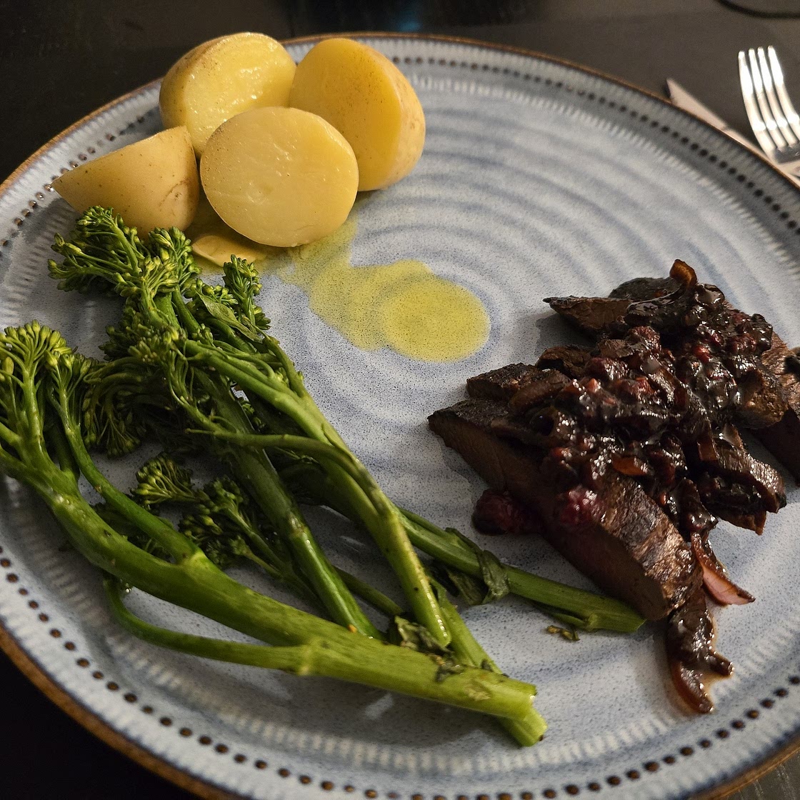 Seared kangaroo with raspberry glaze