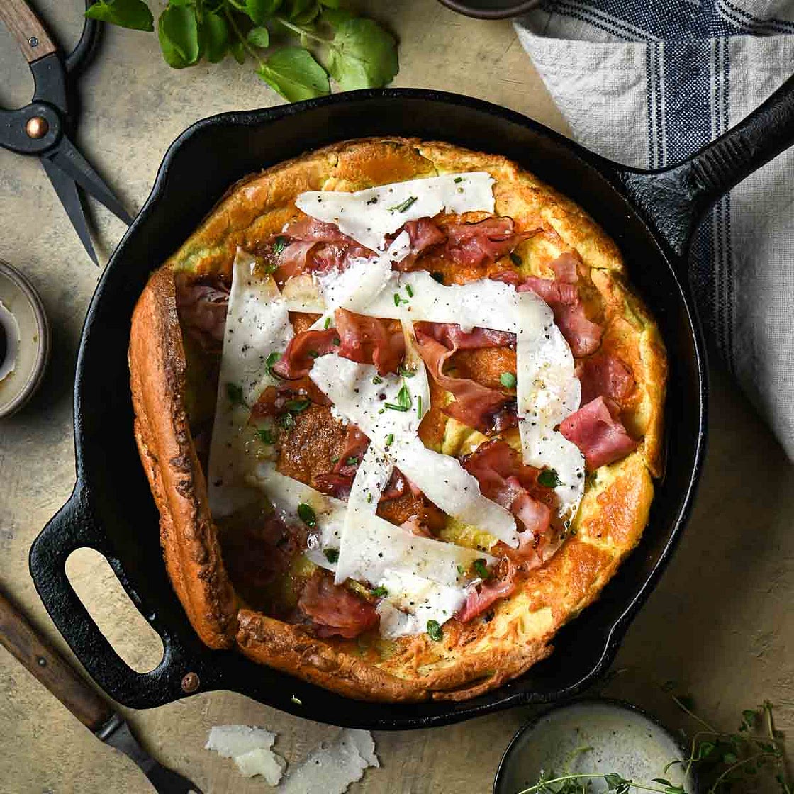 Savory Dutch Baby with Ham, Pecorino, and Fresh Herbs