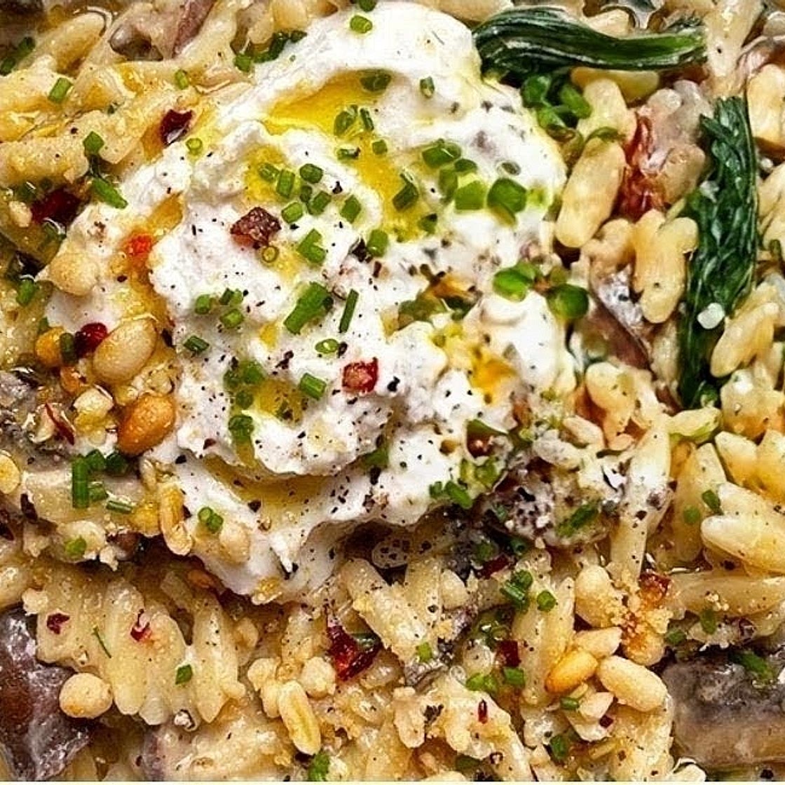 Miso mushroom orzotto with creamy cashew 'labneh' & chilli pine nut crumb