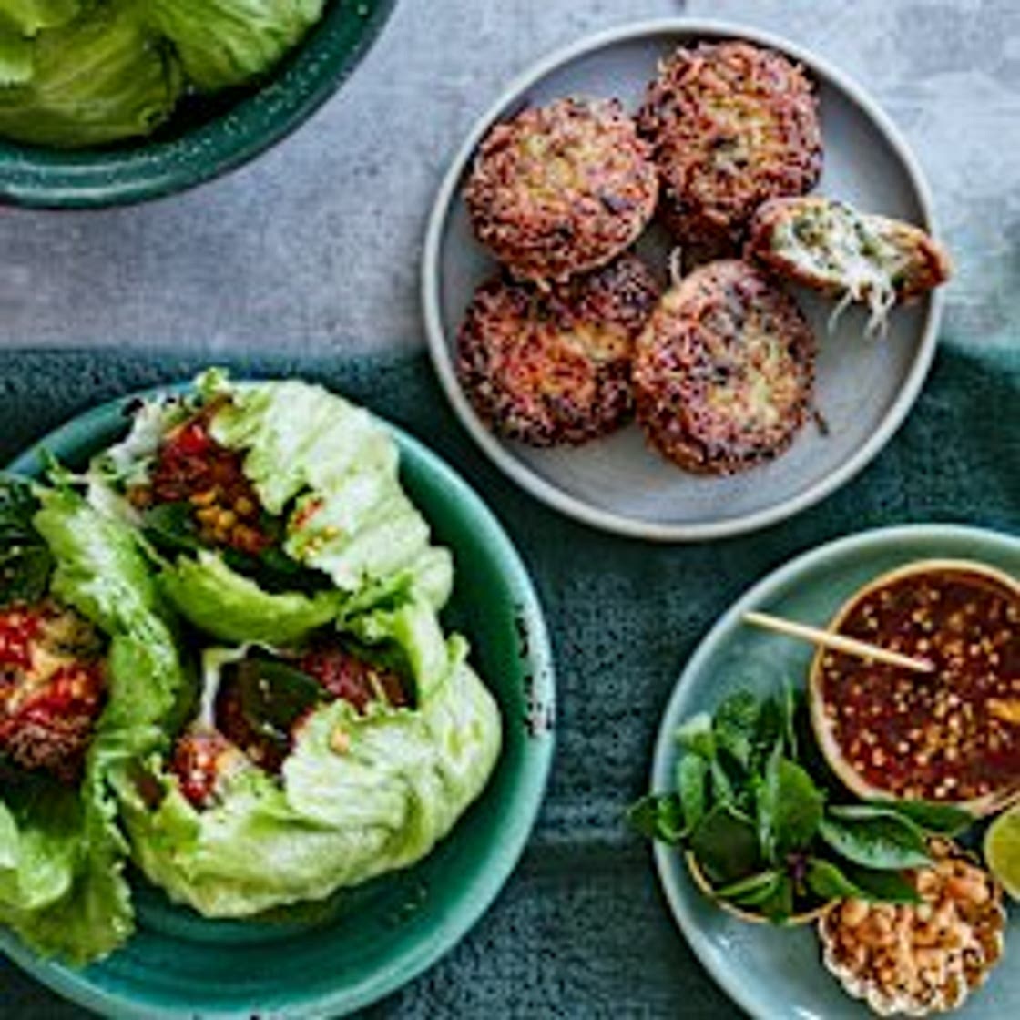 Lettuce cups with pork, vermicelli noodle and lime patties, peanuts and Thai dressing