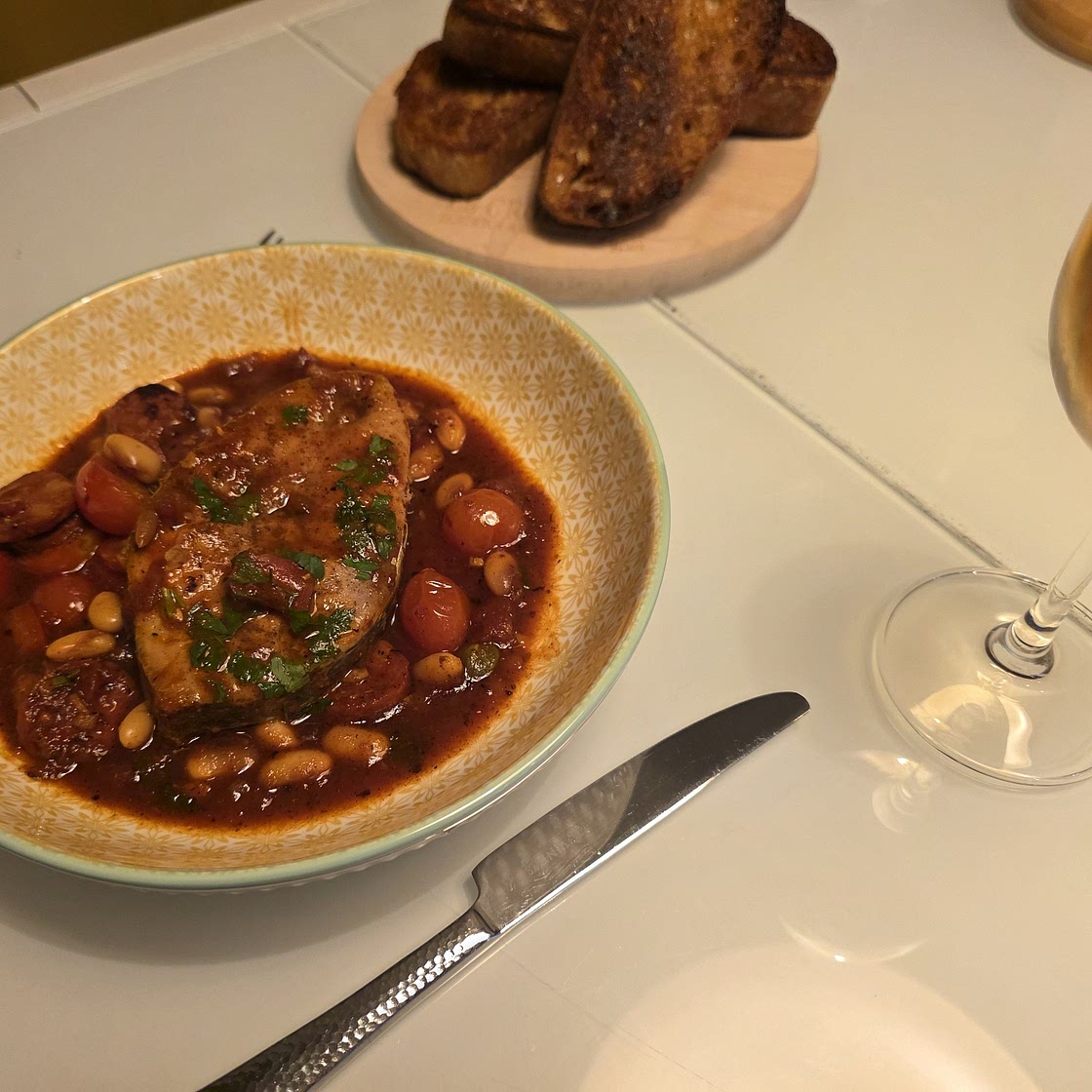 Hake Steaks with Chorizo, White Beans & Saffron Broth