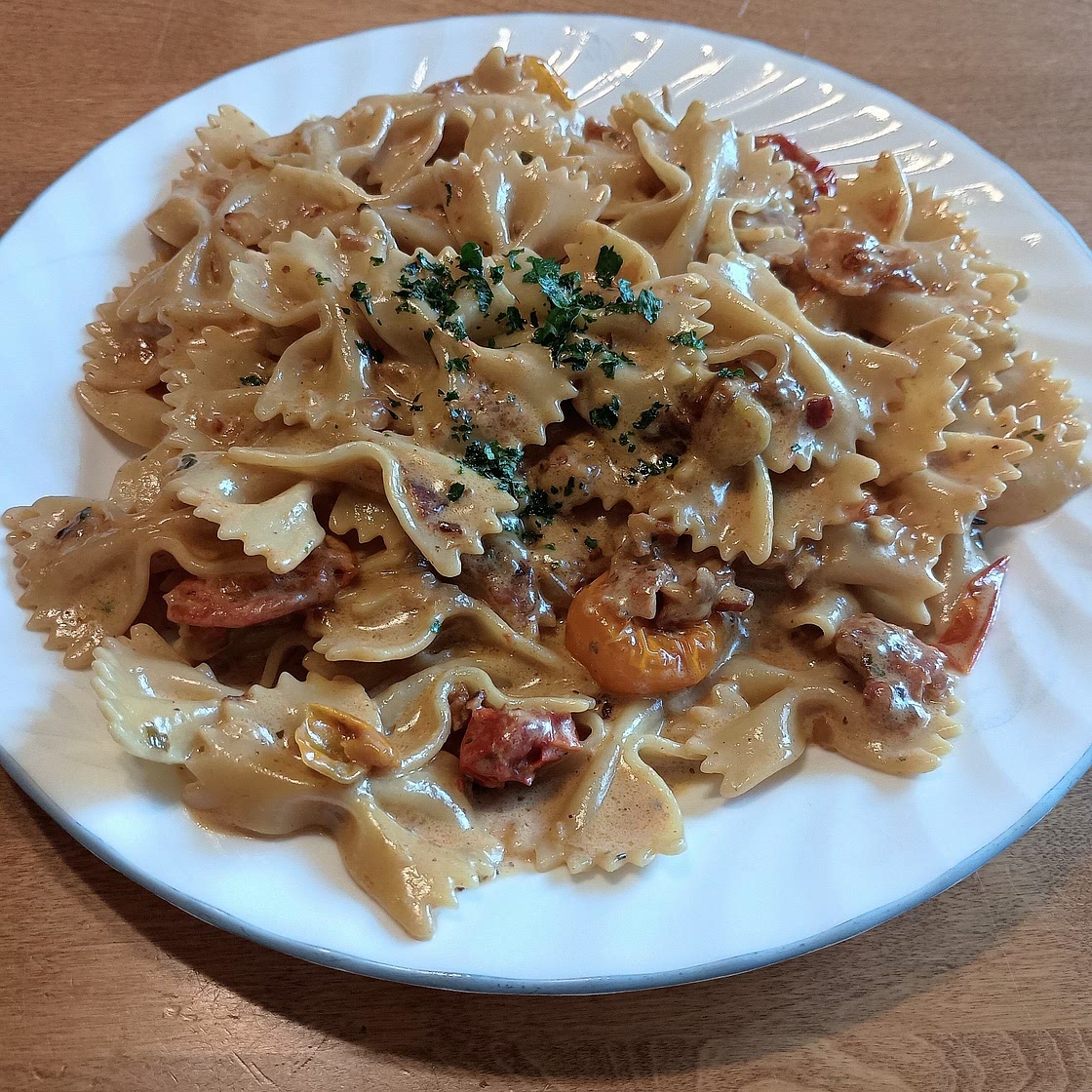 Creamy Pasta with Burst Tomatoes and Bacon Bits